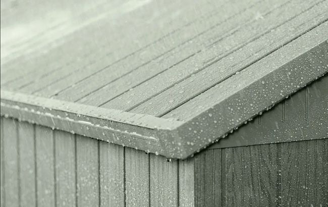 Close-up of a wooden deck with snow accumulation on the roof
